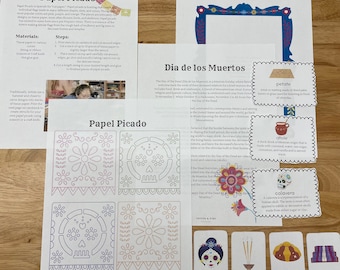 May include: A set of printable cards with illustrations and text about the Day of the Dead, a Mexican holiday. The cards feature images of a sugar skull, a traditional Mexican drink, a type of bread, and an offering. The text on the cards explains the meaning of each item.