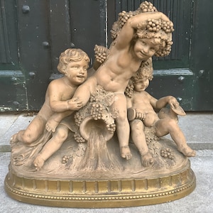 P Balestra June putti copy plaster.