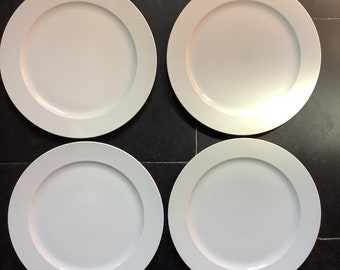 Assiettes à fond en porcelaine blanche diamètre 31 cm. Ensemble de 4.