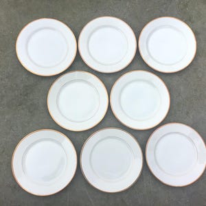 Arzberg Bavaria, set of 8 plates with gold edges.