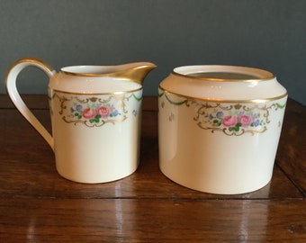 Limoges porcelain sugar bowl and milk jug.