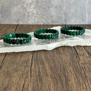 Support your confidence with these Beautifully, Banded Malachite Bangle style stretch bracelets! All are 6.5 inches