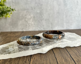 Transform yourself with these Pietersite Bangles. Both are size 7.5 inches (59mm).