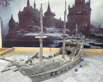 May include: A grey model of a sailing ship, featuring detailed masts, decks, and a figurehead. Small figures are placed on the deck. The ship is set against a backdrop of a dark castle scene, with dice nearby, suggesting a tabletop game.