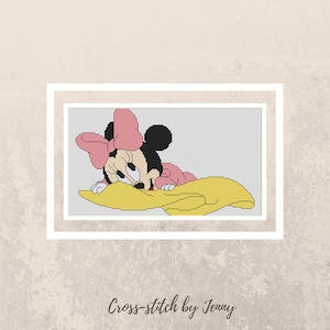 May include: Cross-stitch pattern of a cartoon mouse wearing a pink dress and bow, lying on a yellow pillow. The pattern is titled "Cross-stitch by Jenny".