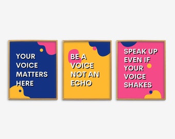 May include: Three framed prints with motivational quotes in a bold, modern font. The prints feature a yellow background with blue and pink abstract shapes. The quotes are: "Your voice matters here", "Be a voice not an echo", and "Speak up even if your voice shakes".