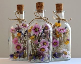 Dried flowers in jars / candlesticks