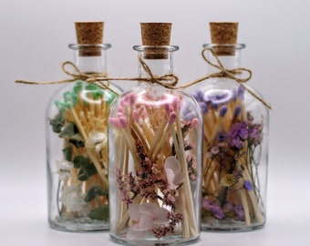 Match bottle with dried flowers