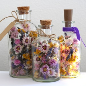 Dried flowers in jars / candlesticks