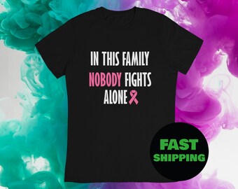 In This Family Nobody Fights Alone Shirt, Cancer Support Shirt, Pink Ribbon, Breast Cancer Shirt, Cancer Warrior Shirt, Cancer Awareness.