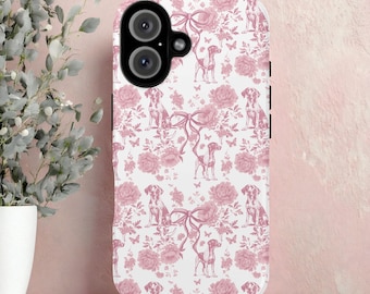 May include: A white phone case with a repeating pattern of pink roses, bows, butterflies, and dog illustrations. The case has a dual-lens camera cutout and black side buttons. The design is a toile-inspired print.