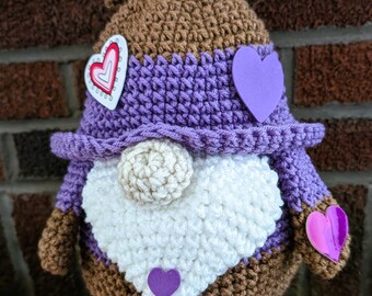 My bear gnome is adorned with hearts to show your special someone how much they are loved.