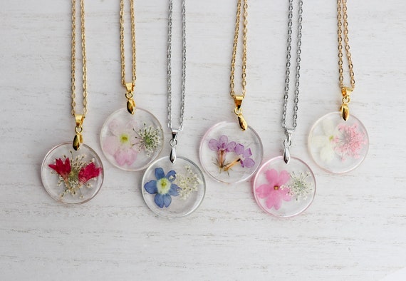 Necklace with flowers best sale inside