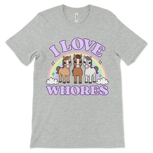 Funny offensive t shirt with the phrase “I Love Whores” and cartoon horses, dirty raunchy design perfect for inappropriate tshirt exchange party or adult humor fans.
