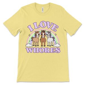 Funny offensive t shirt with the phrase “I Love Whores” and cartoon horses, dirty raunchy design perfect for inappropriate tshirt exchange party or adult humor fans.