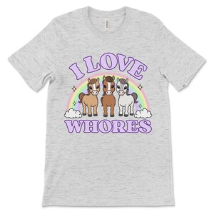 Funny offensive t shirt with the phrase “I Love Whores” and cartoon horses, dirty raunchy design perfect for inappropriate tshirt exchange party or adult humor fans.
