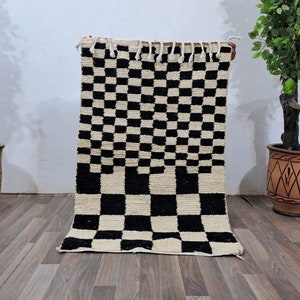 Handmade Wool Moroccan Rug: Black and White Checkered Design