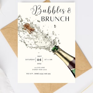 May include: A white invitation card with black text that reads "Bubbles & Brunch" with a champagne bottle popping and a cork flying out. The date is July 06, 2025 at 11 AM. The address is 123 Syd Lane, Sydney NSW 2000. The RSVP is to Jane at 0435 768 593.