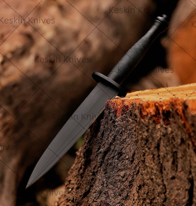 Fairbairn Sykes-style commando knife replica with black grip handle