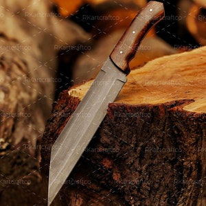 May include: A large, silver knife with a wooden handle. The knife is resting on a wooden stump.
