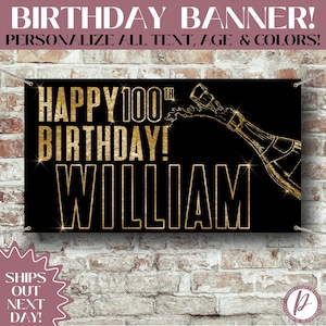 May include: Black banner with gold text that reads "HAPPY 100TH BIRTHDAY! WILLIAM". A gold champagne bottle graphic is on the right. The banner is suspended by grommets. The top of the banner reads "BIRTHDAY BANNER! PERSONALIZE ALL TEXT, AGE & COLORS!"