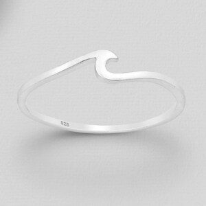 May include: A silver wave ring with a 925 stamp.