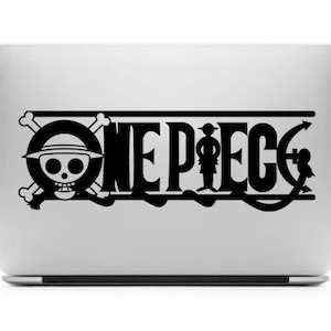 May include: Black and white sticker featuring the One Piece logo with a skull and crossbones, a silhouette of a person, and an anchor.