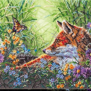 May include: A detailed beaded artwork depicting a fox in a field of flowers. The fox, with orange, brown, and white fur, is gazing at a butterfly. The scene is filled with colorful flowers in shades of purple, yellow, and blue.