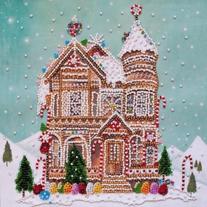May include: A detailed, beaded gingerbread house with white frosting, candy cane accents, and colorful decorations. The house features multiple windows, a tower, and is set against a snowy, wintery backdrop with evergreen trees and falling snow.
