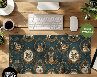 May include: A teal blue mousepad with a repeating pattern of gold framed portraits of rabbits. The portraits have a vintage aesthetic and feature rabbits in various poses. The mousepad has the text "Grind Royale" in the bottom left corner.