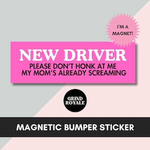May include: A pink magnetic bumper sticker with the text "NEW DRIVER PLEASE DON'T HONK AT ME MY MOM'S ALREADY SCREAMING." A pink starburst shape reads "I'M A MAGNET!" The Grind Royale logo is in a black circle.