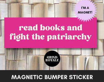 May include: A rectangular magnetic bumper sticker with a bright pink background featuring the white text read books and fight the patriarchy. A light purple starburst shape in the corner says I'M A MAGNET! A black circle displays the text GRIND ROYALE.