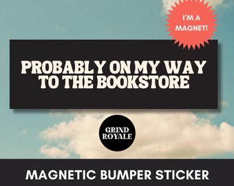 May include: Black and white magnetic bumper sticker with the text "Probably on my way to the bookstore" and a red star with the text "I'm a magnet!"  The sticker also features a black circle with the text "Grind Royale".