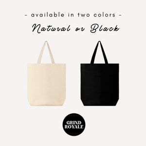 May include: Two tote bags, one natural canvas and one black, with the text "Grind Royale" in a circle below. The text above the bags reads "available in two colors - Natural or Black".