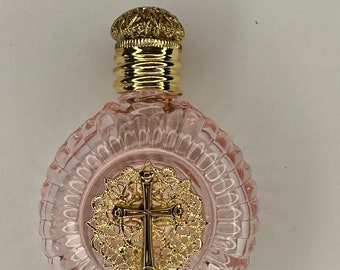 The Holy Water Bottle- pink glass-brass emblem of the Holy Cross