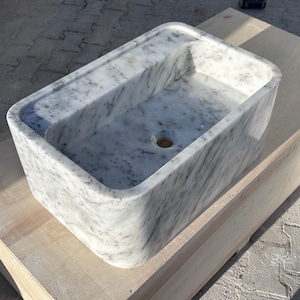 in stock - white marble sink