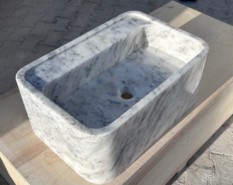 lavabo de mármol blanco