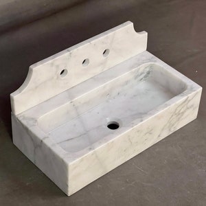 White carrrara marble sink , powderroom sink