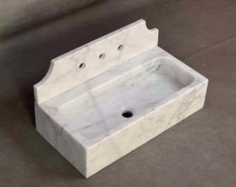White carrrara marble sink , powderroom sink