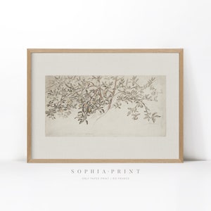 Op de afbeelding: Een ingelijste print van een aquarel van een tak met bladeren en vruchten. De achtergrond is lichtbeige. De print is in een licht houten lijst.