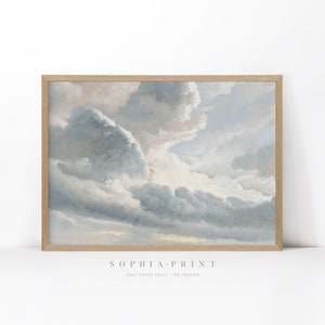 May include: A framed print of a painting depicting a cloudy sky with shades of blue and gray. The clouds are arranged in a dynamic pattern, creating a sense of movement and depth. The print is framed in a simple wooden frame.