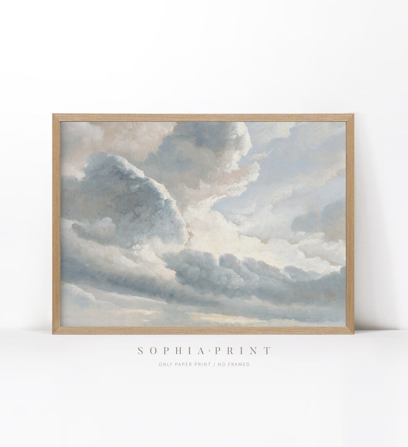 May include: A framed print of a painting depicting a cloudy sky with shades of blue and gray. The clouds are arranged in a dynamic pattern, creating a sense of movement and depth. The print is framed in a simple wooden frame.