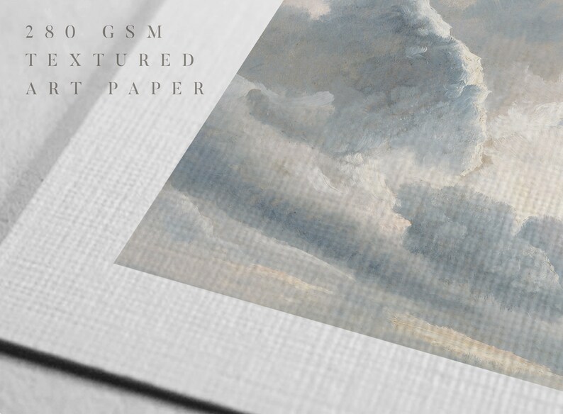 May include: Close-up of a textured white art paper with the text "280 GSM TEXTURED ART PAPER" printed on it. The paper has a subtle grain and a soft, matte finish.