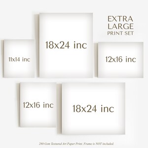 May include: A set of four white framed prints with brown text indicating the size of each print. The sizes are 11x14 inches, 12x16 inches, 18x24 inches, and 18x24 inches. The text "EXTRA LARGE PRINT SET" is at the top of the image.