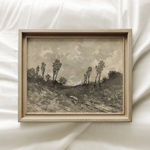 May include: A framed black and white landscape painting of a dirt road leading through a field of trees. The painting is in a light wood frame with a white mat.