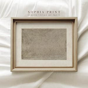 May include: A framed print of a vintage document with a light brown background. The document is filled with text in a black ink. The frame is a light wood color. The text at the top of the frame reads "SOPHIA PRINT CURATED VINTAGE ART PRINTS". The text at the bottom of the frame reads "SOPHIA PRINT".