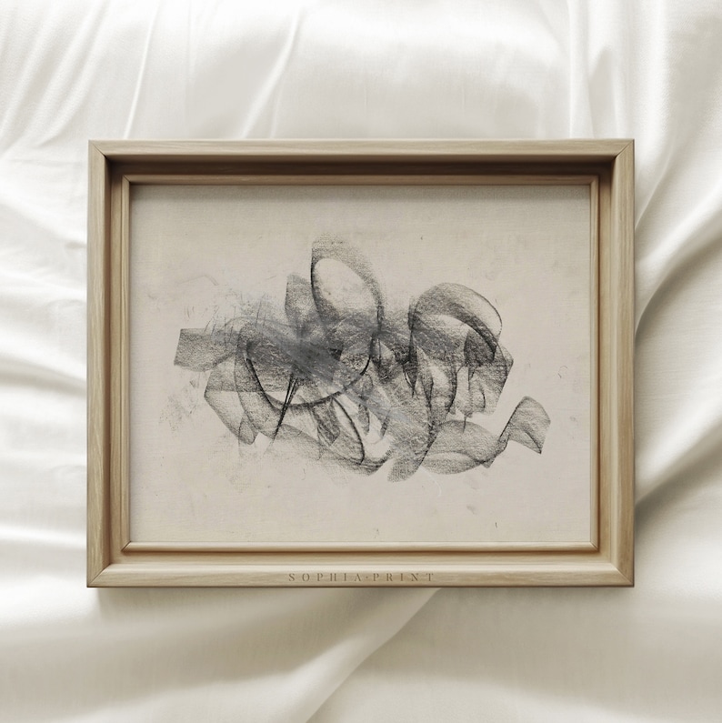 Op de afbeelding: Een ingelijste zwart-wit abstracte kunstprint met de tekst "SOPHIA PRINT" onderaan.