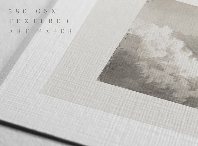 May include: Close-up of a textured white art paper with the text "280 GSM TEXTURED ART PAPER" printed on it. The paper has a subtle grain pattern.
