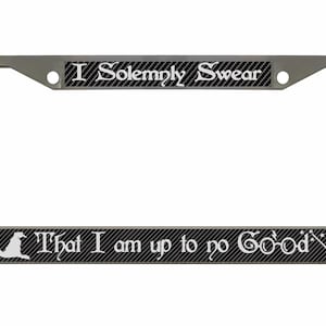 May include: A silver license plate frame with black and white text that reads "I Solemnly Swear That I am up to no Good." The frame has a black and white striped pattern.