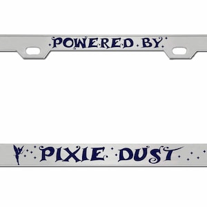 May include: Silver license plate frame with blue text that reads "Powered by Pixie Dust" with a fairy silhouette and stars.
